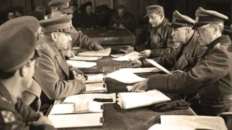 General Charles Foulkes getting the surrender signed